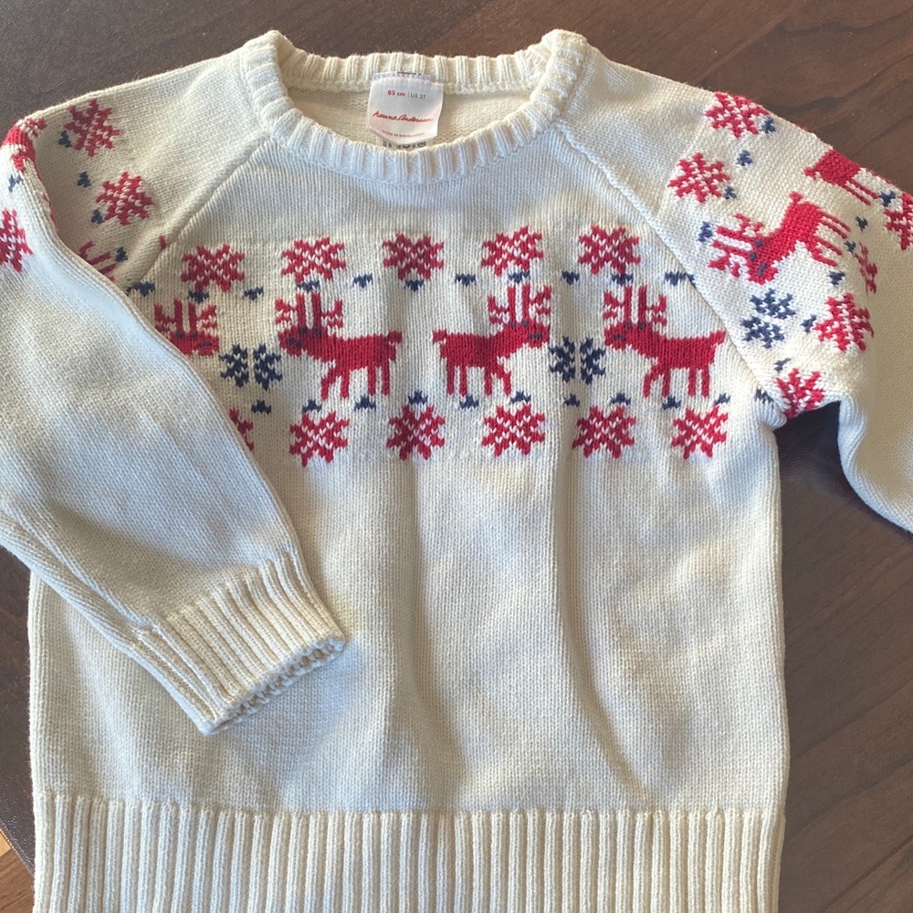 Hanna Anderson Cream Sweater with Red and Blue Reindeer Pattern